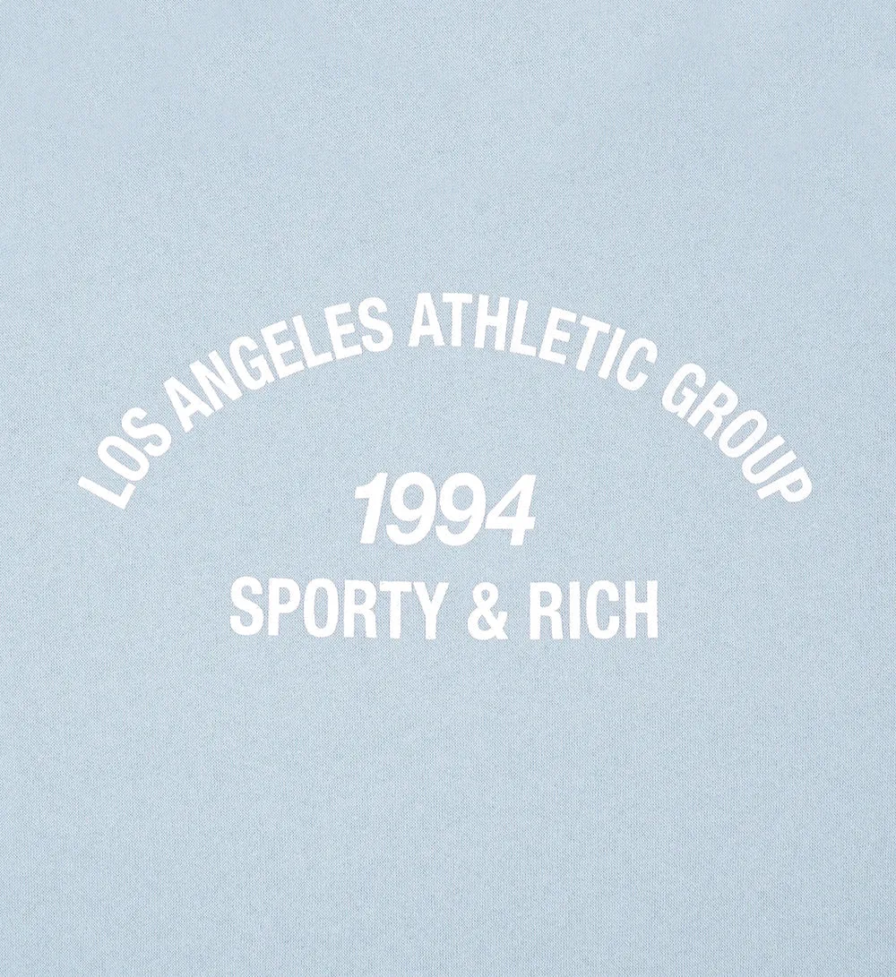 Sporty & Rich LA Athletic Grp Disco Shorts in China Blue